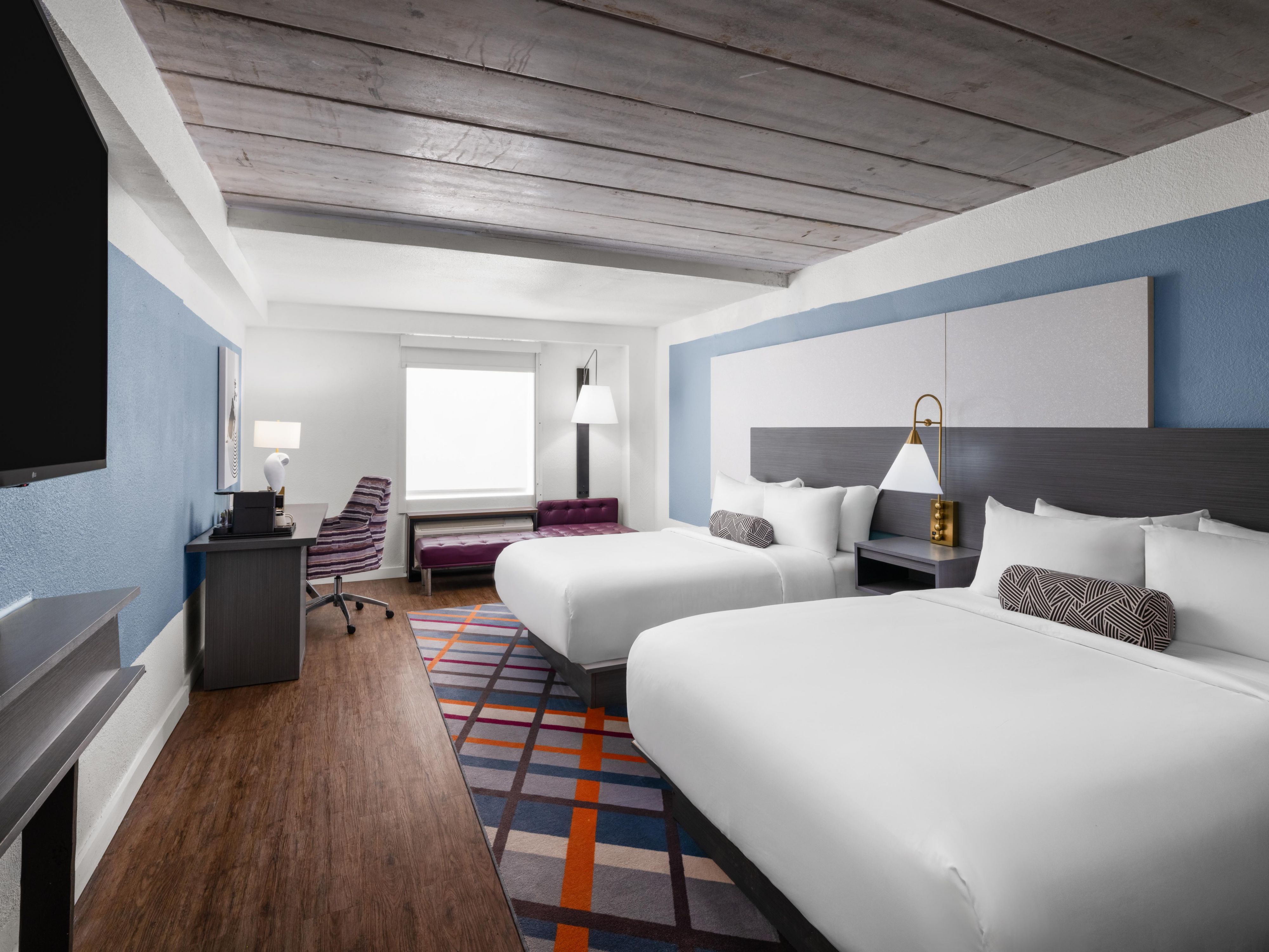 Relax in a modern double-queen room in College Station.