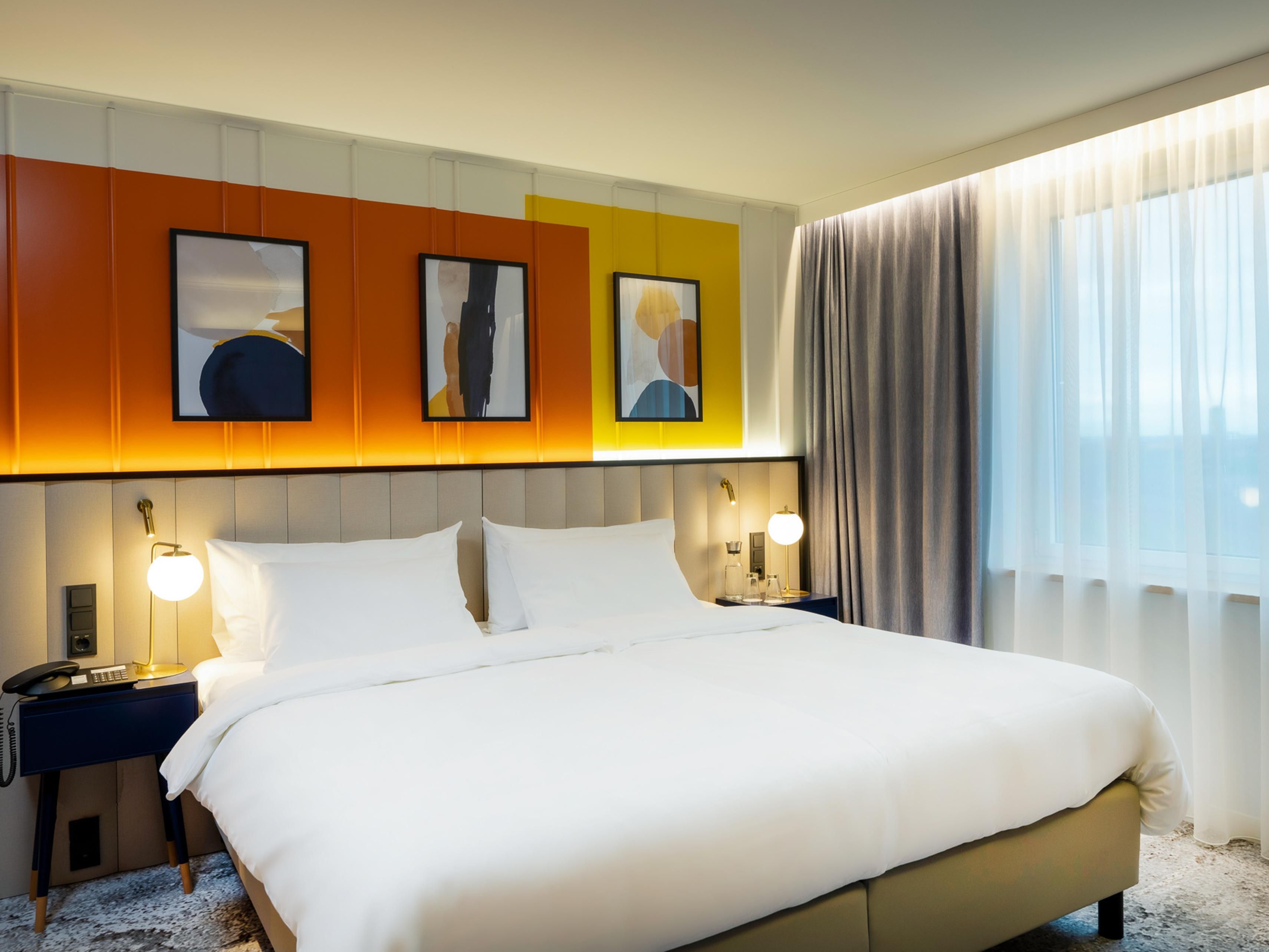 Choose among four categories of spacious, beautifully appointed and air-conditioned bedrooms of minimum 25 sqm.
Standard, Deluxe, Premium or Suites. Cozy and indulgent beds as well as free Wi-Fi, Tea & Coffee making facilities and safes will ensure the high level of comfort.