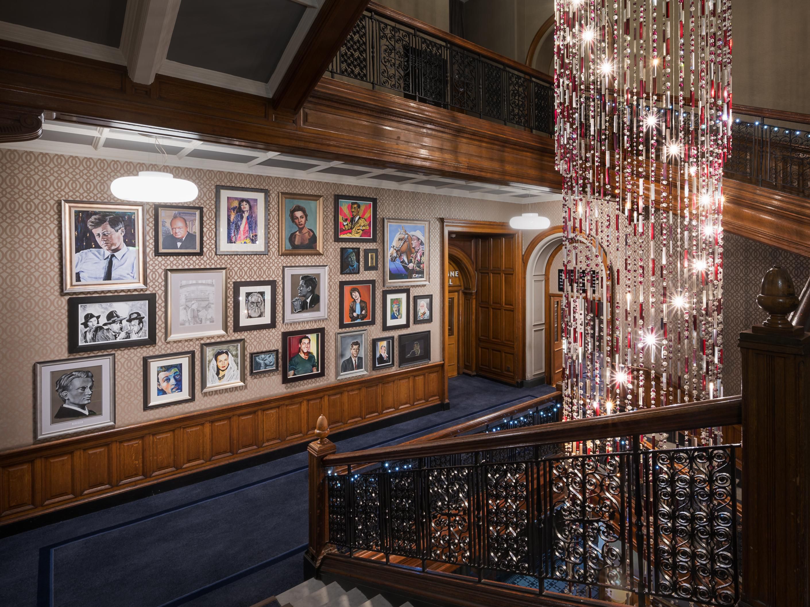 Our iconic chandelier and Wall of Fame portrait gallery