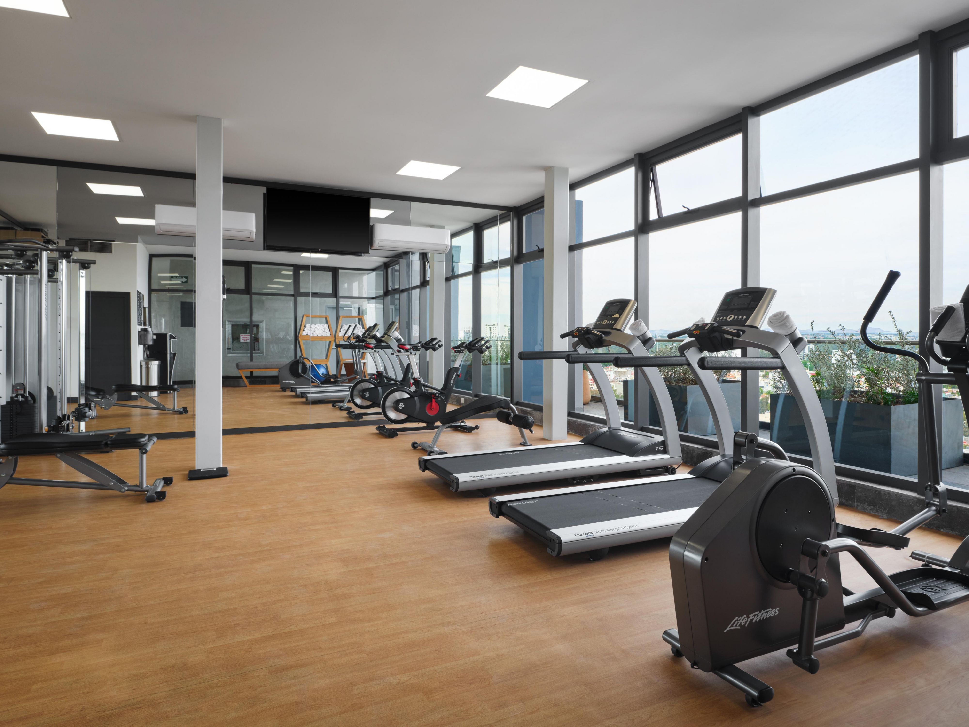 Enjoy stunning city view while you workout in our Fitness Center.