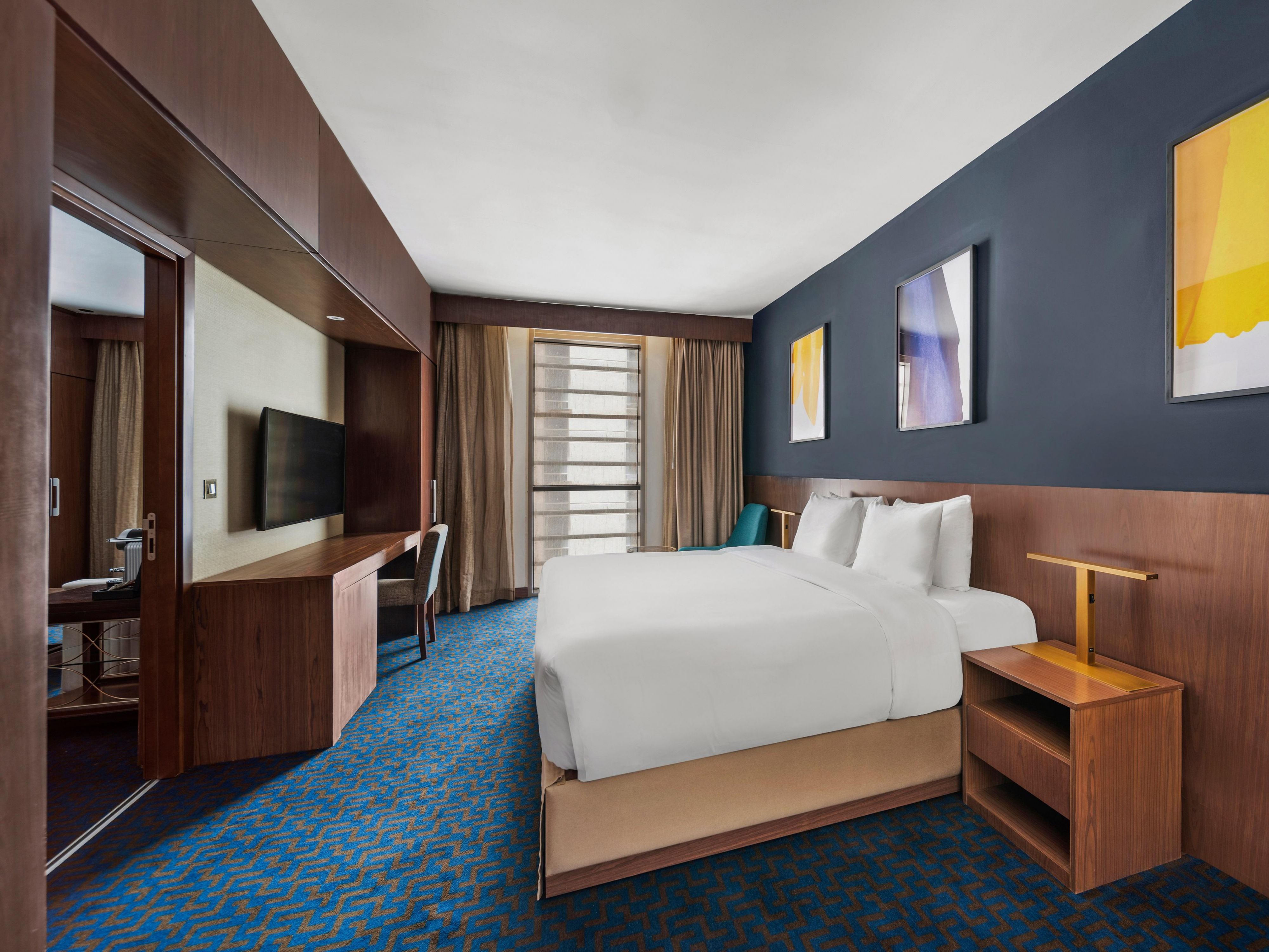 The Bedroom suite offers a spacious bedroom and a living room