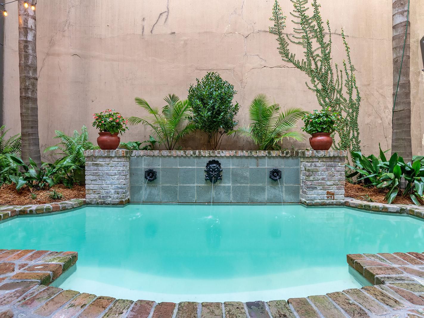 Dip your feet in our courtyard pool after a day of sightseeing.