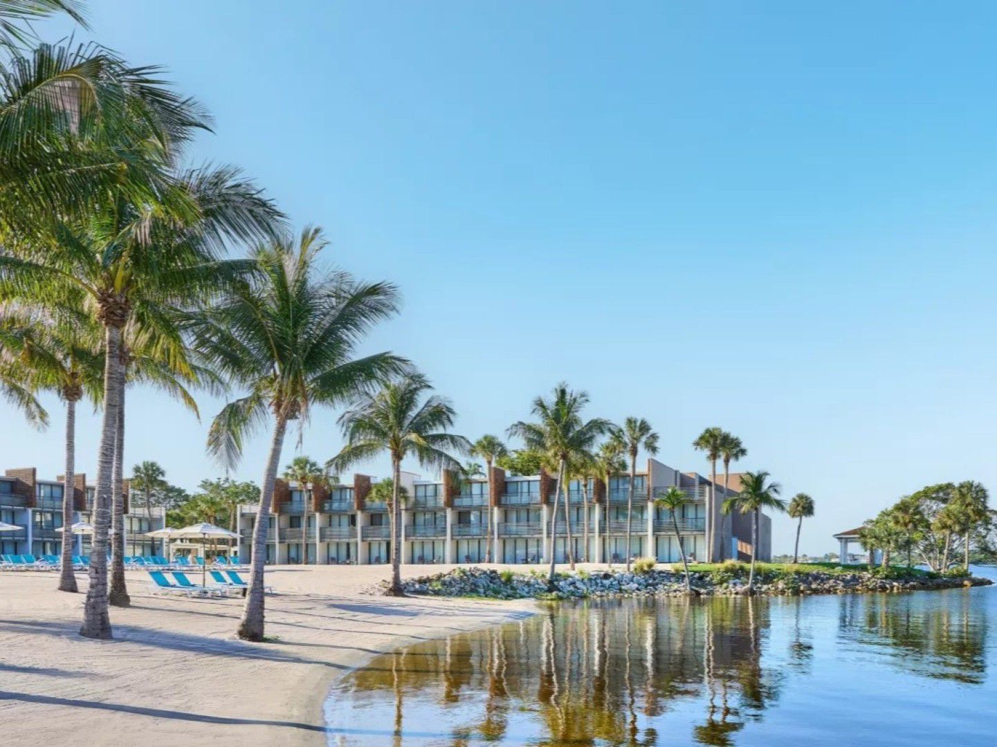 An exterior image of the beach at voco Sandpiper All-Inclusive Resort.