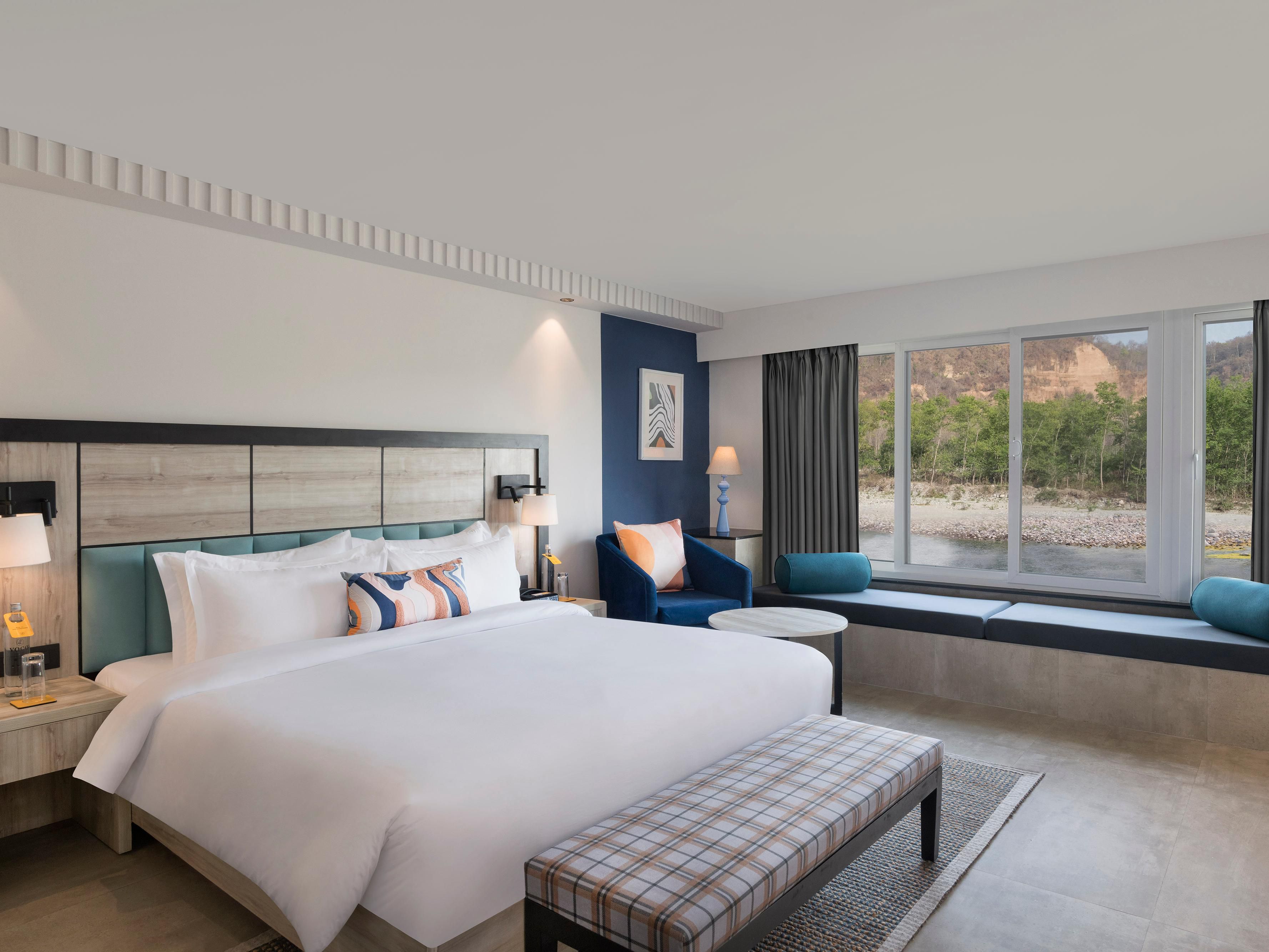 Located along the gentle curves of the Kosi riverside, voco Jim Corbett invites guests to find solace and enjoy moments of solitude. If you’re looking for resorts near Delhi NCR for the weekend, this harmonious retreat by the riverside offers you a refuge from the hustle and bustle of the world.