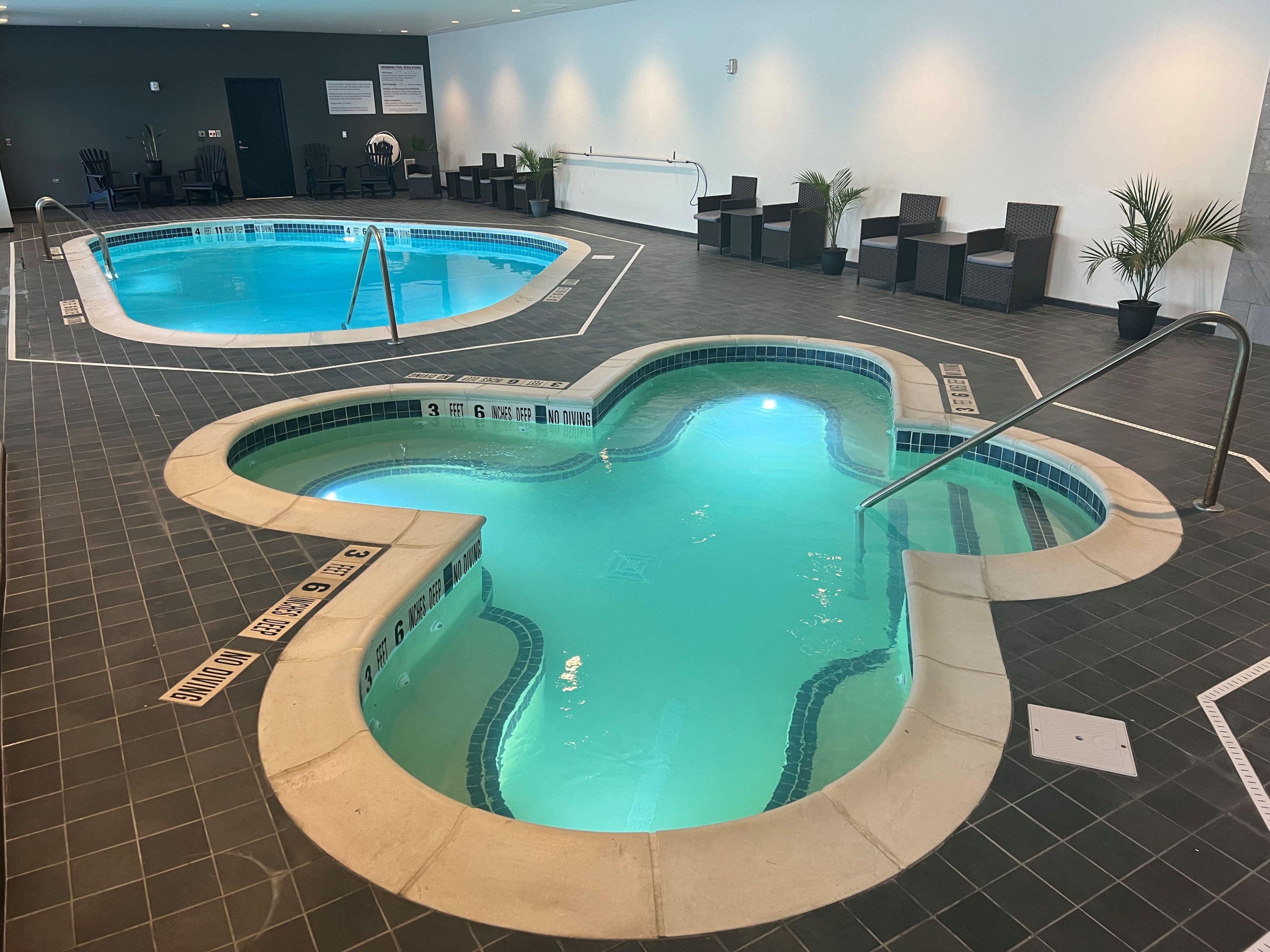 Relax and rejuvenate at our indoor pool and hot tub, open daily from 8:00am – 10:00pm for your year-round enjoyment. Whether you like to swim laps, make a splash, or unwind with a soothing soak in the hot tub, our indoor pool provides the perfect place for recreation and relaxation during your stay.