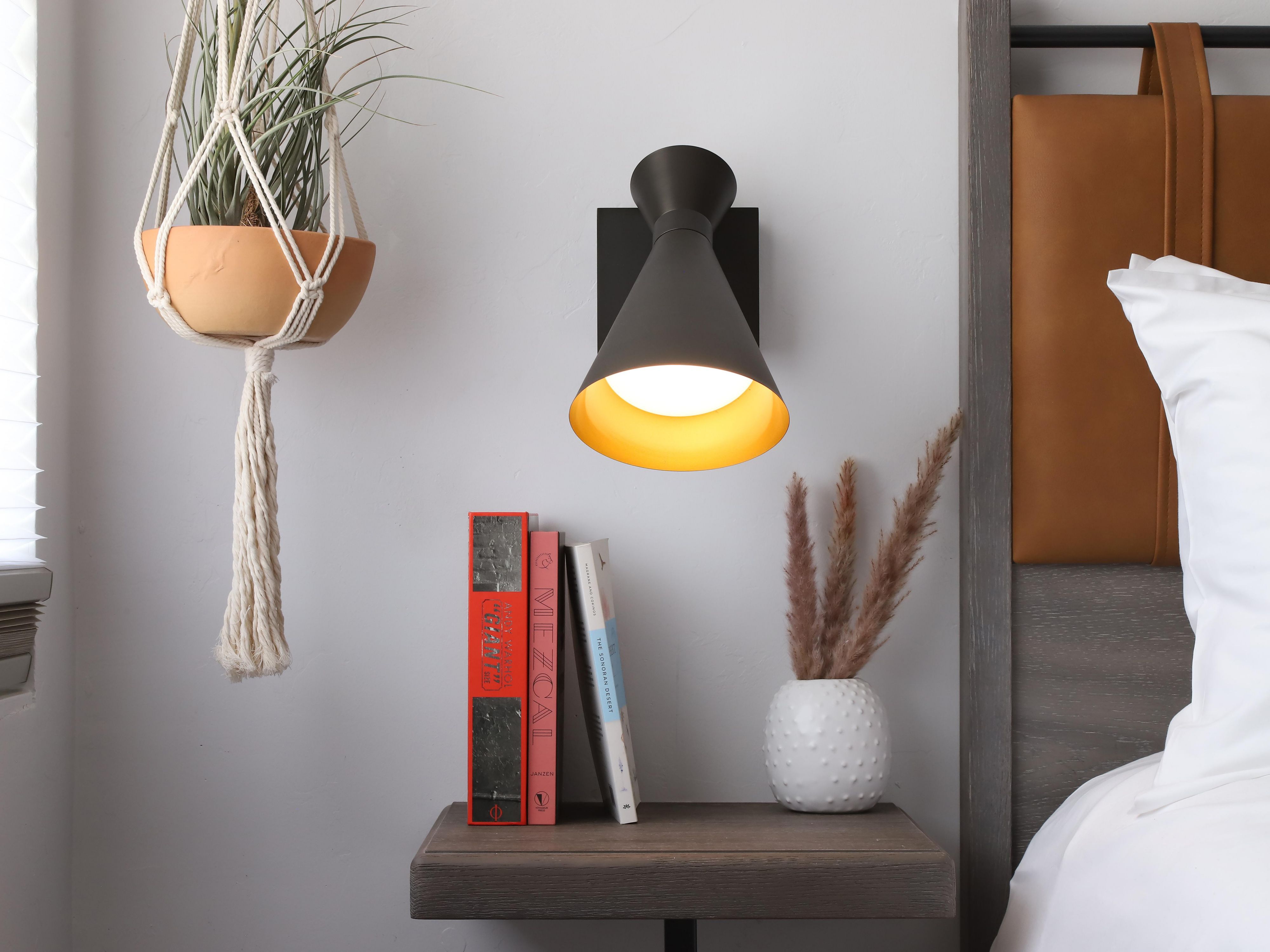 Our boutique rooms blend desert-modern style with motor lodge soul. Expect walk-in tile showers, Marshall Bluetooth speakers, curated Tucson art, and beds that actually deliver on sleep. Smart and stylish, they reflect the city around them—bold, warm, and full of character.