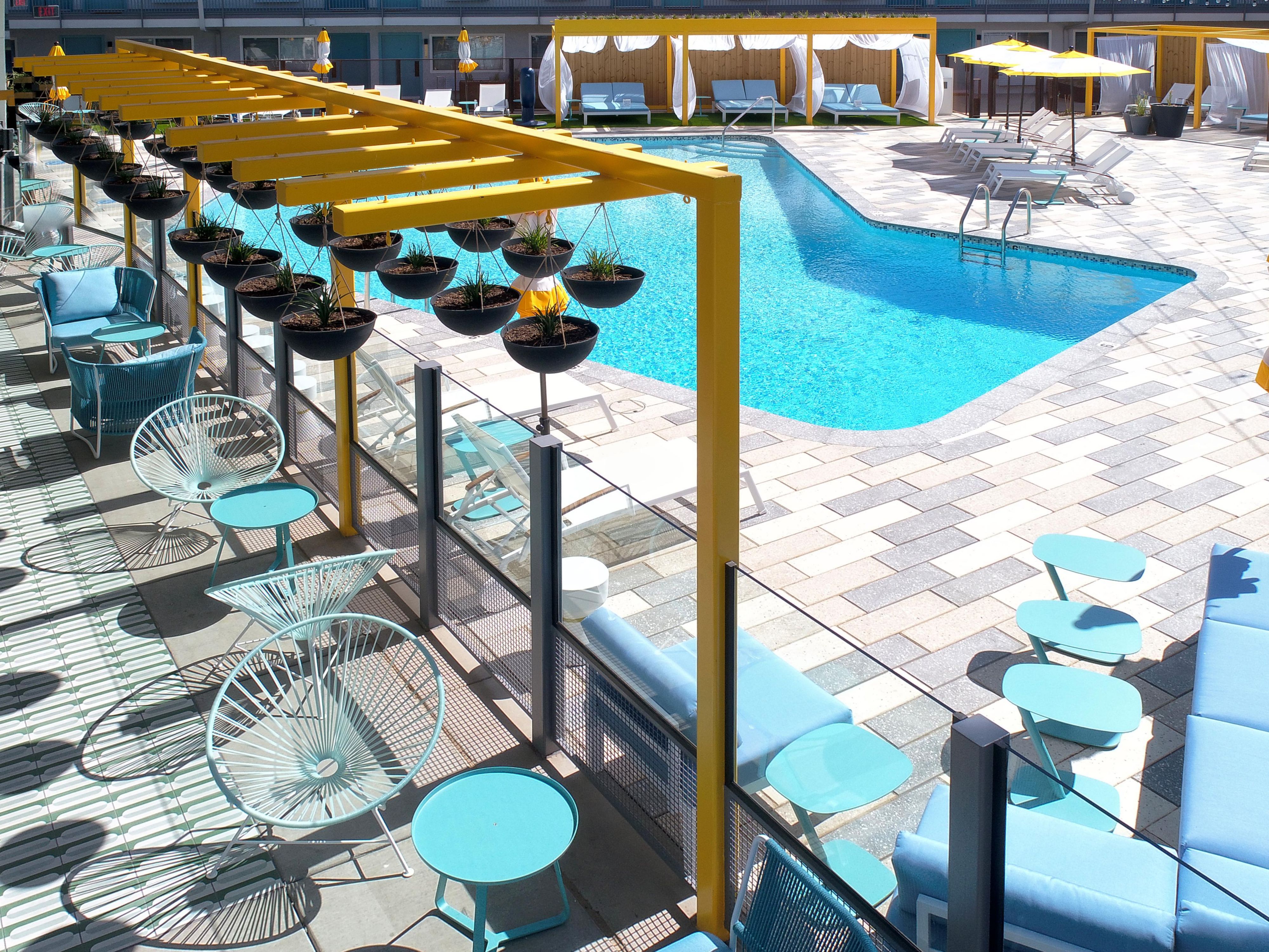 Our boomerang-shaped pool is Tucson’s most photogenic hangout. Lounge under striped umbrellas, sip chili-laced slushies from Shady Cactus Swim Club, and join the daily 5:30 Shady Toast. Locals and travelers mix over Baja bites, beats, and golden hour magic. No shoes required—vibe guaranteed.