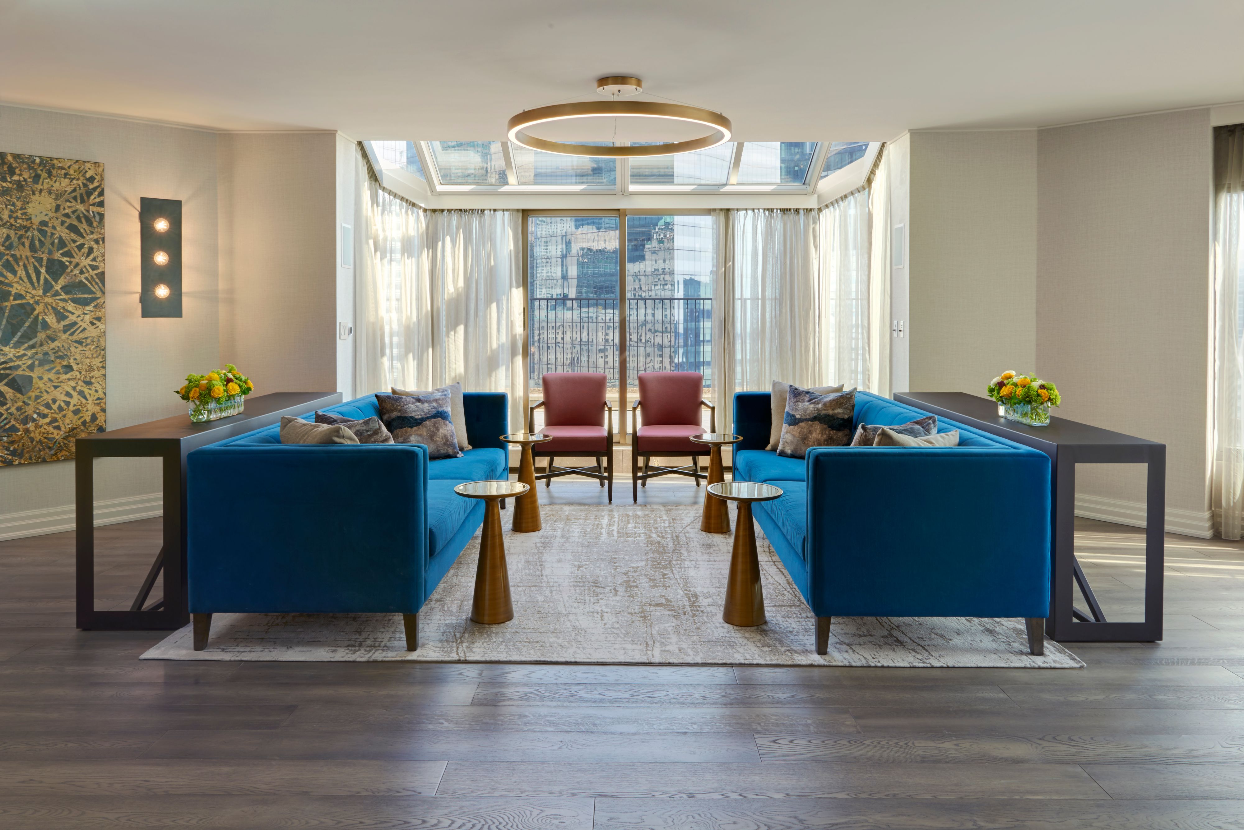 Presidential suite living room at InterContinental Toronto with blue couches